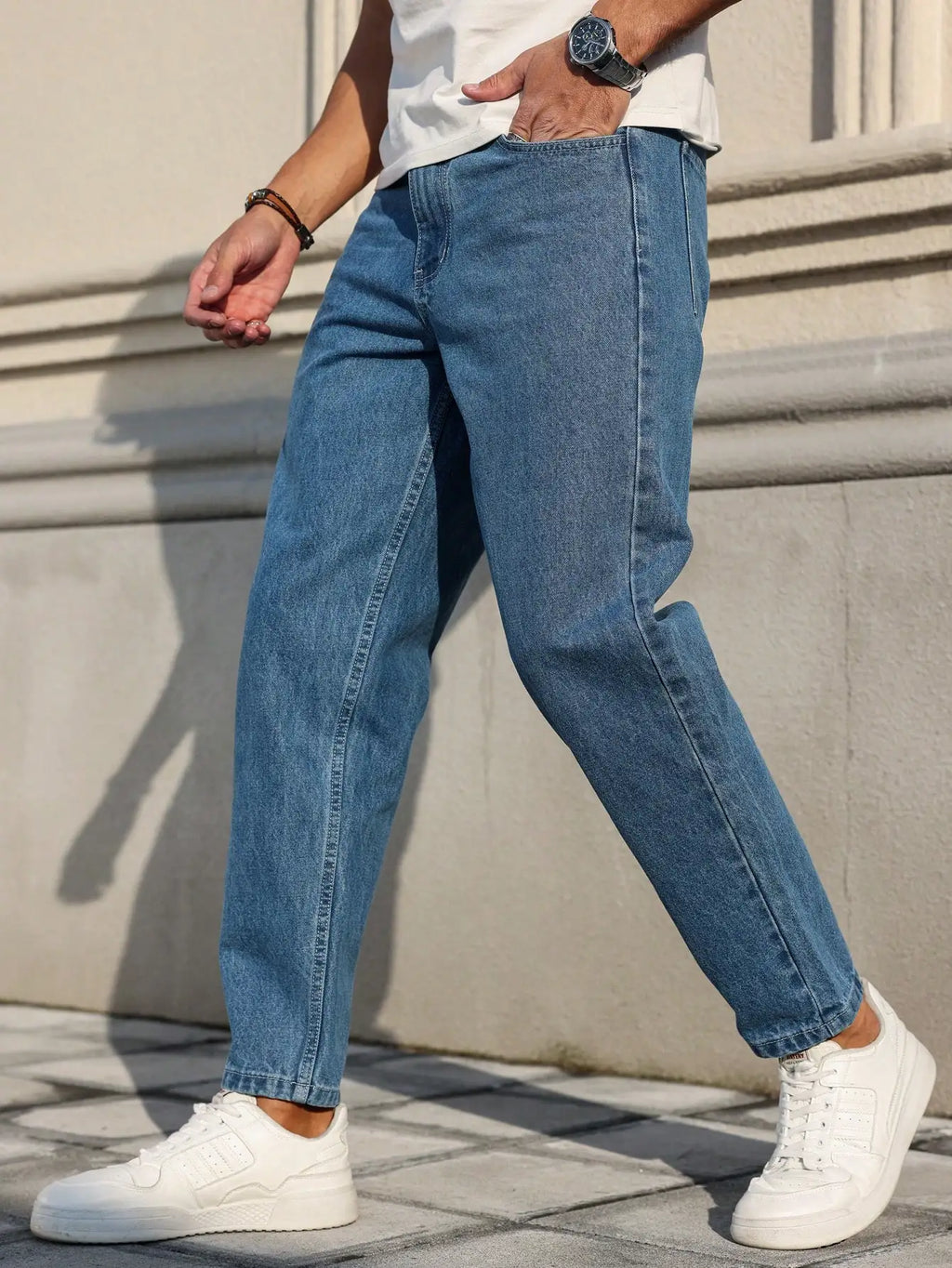 LOR MALE Men's Jeans Are Made of Classic Blue Denim Fabric with a Loose Fit, Making Them an Indispensable Versatile Item in the Wardrobe.