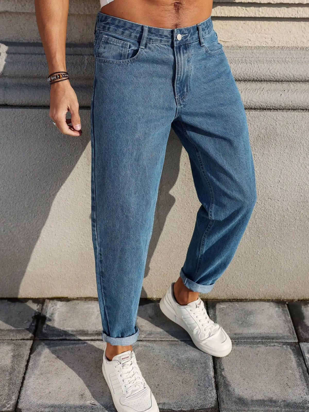LOR MALE Men's Jeans Are Made of Classic Blue Denim Fabric with a Loose Fit, Making Them an Indispensable Versatile Item in the Wardrobe.